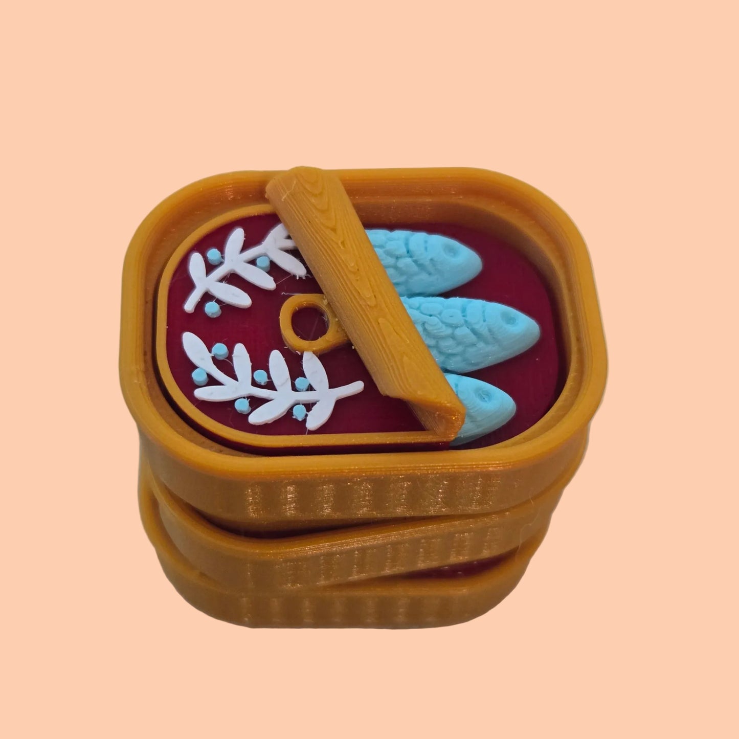 Close-up of Sardine Tins clicker keychain showing clickable details, 3D printed in NZ